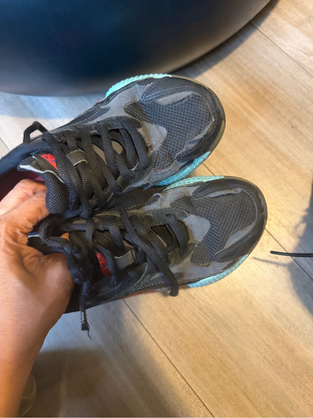 Puma Kids Black Sneakers with Teal Accents